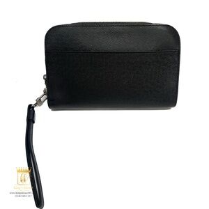 Louis Vuitton tiaga clutch